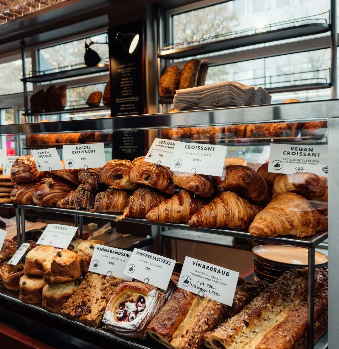a bakery filled with lots of different types of pastries